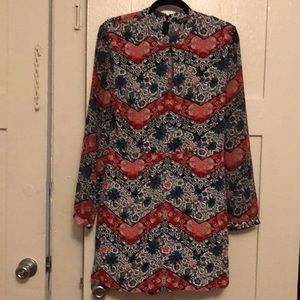 Floral long sleeved sexy romper size 10